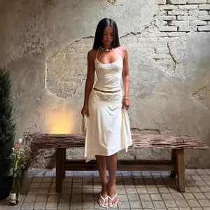 Niche Two-Piece Set: Strapless Tank Top and Asymmetrical Skirt, Overseas-Style Lace Patchwork Set for Women, Summer, Slim-Fit, Soft and Feminine Style