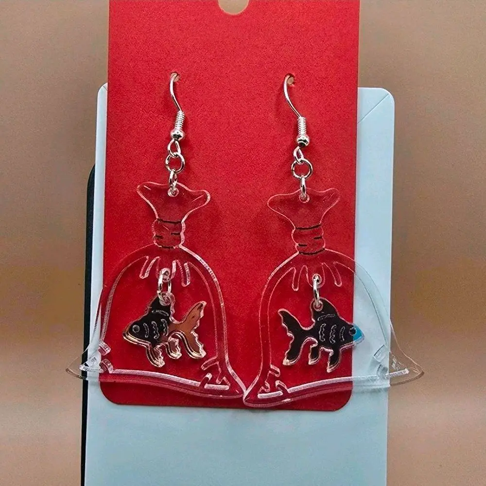 5) Fish in Bag Earrings