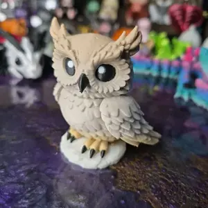 Owl Figurine with Detailed Features and Unique Design