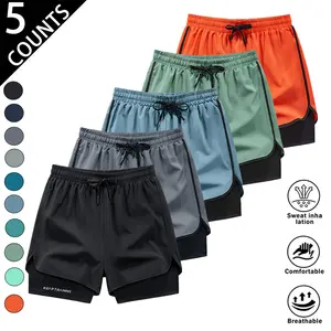*Pack of 5 men’s double-layer athletic shorts featuring a drawstring elastic waistband, built-in anti-exposure lining, breathable quick-dry fabric, and a loose, comfortable fit—ideal for fitness, running, outdoor training, and everyday casual wear.