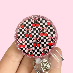 Glitter My Badge This pink bow cherry badge reel for nurse and hospital workers. Badge clip Badge pull - Retractable swivel clip with a 360 rotation. Great gift for coworker.