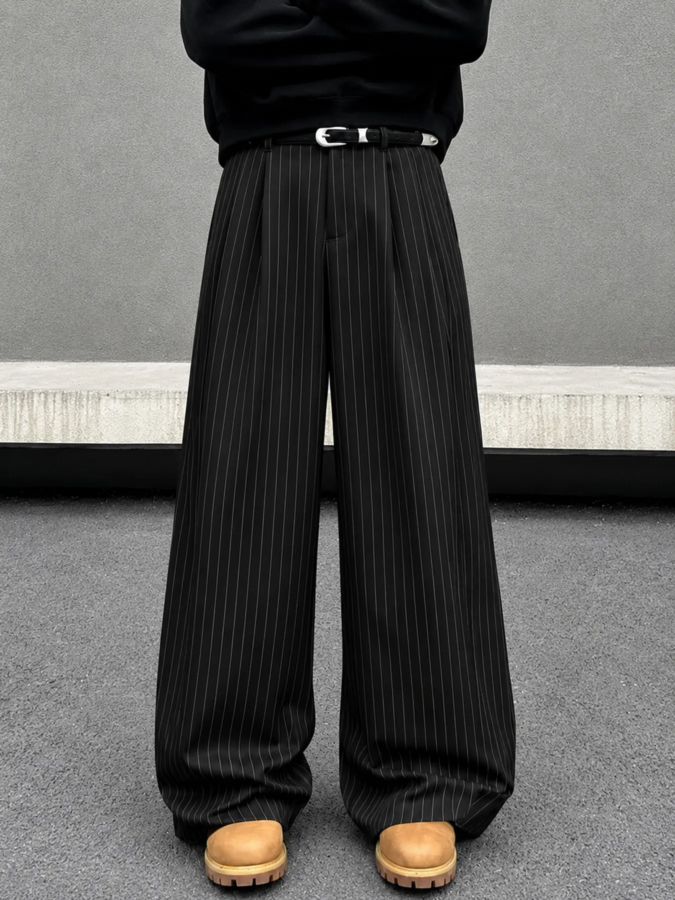 Men's Pinstripe Trousers Bring a Relaxed Pleated Fit to Back-to-College Outfits and Smart-Casual Street Style