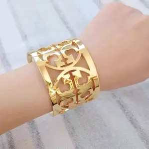 TB Gold Stainless Steel Cuff Bracelet