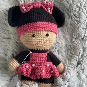 Crochet doll in mouse outfit
