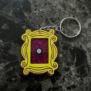 FRIENDS Peep Hole Keychain