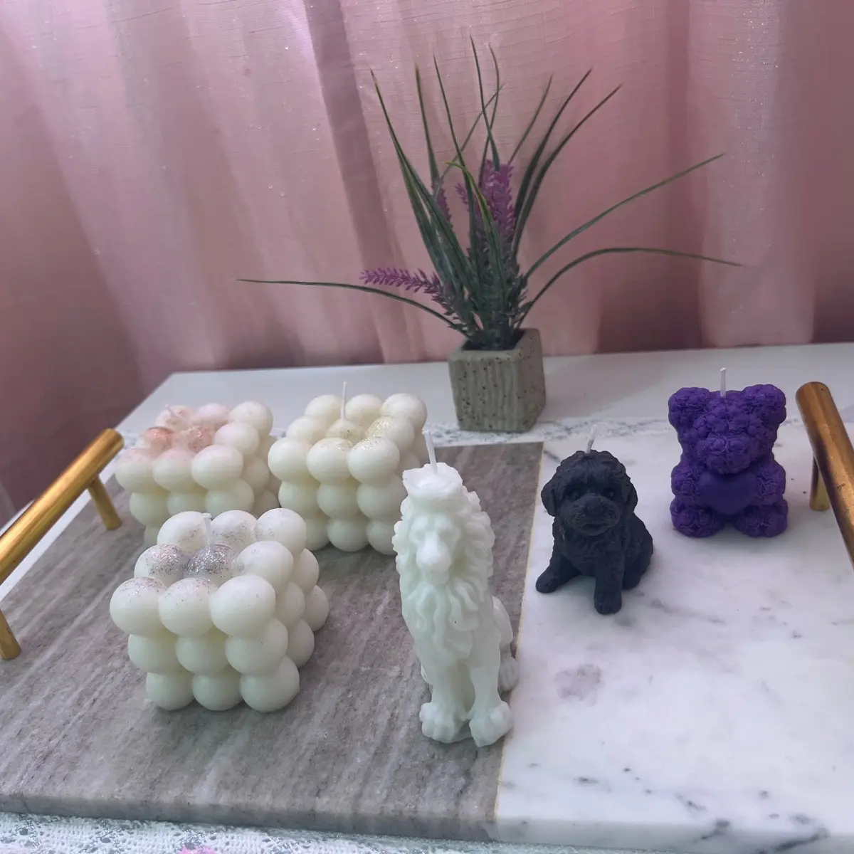 Mixed designed candles for $50.
