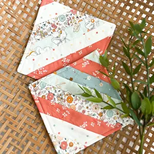 Set of two quilted scrappy coasters