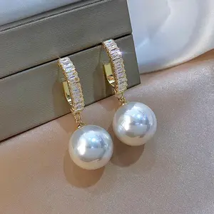 Female elegant dangling earrings white epoxy wedding gauges van cleef bridal jewelry