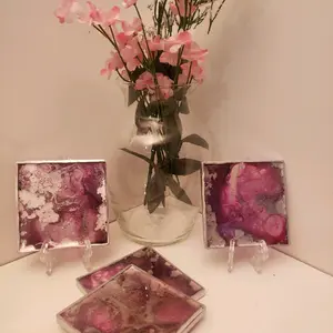 Set of 4 resin coasters with holder