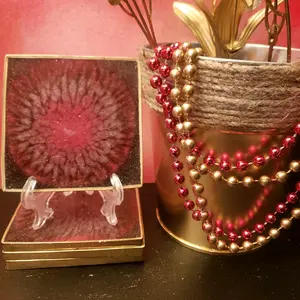 set of 4 red resin coasters with holder